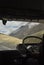 Unrecognized person driving passenger van (tempo traveller) in Manali-Leh highway with beautiful mountains