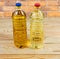 Unrefined cold-pressed and refined sunflower oil in two bottles