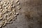 Unroasted green coffee beans on wooden background - Close up