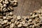 Unroasted green coffee beans on wooden background - Extreme clo