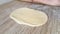 Unrolling dough with rolling pin