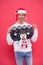 Unshaven man funny sweater red background. male cold weather fashion. santa man ready for winter holiday. xmas party and