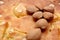 Unshelled almond nuts on a freshly backed frangipane tart or cake