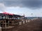 Unsightly abandoned resort bamboo and wooden cottages left untended by the owners