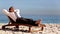 Unstressed businessman relaxing on the beach