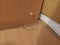 Unsuccessful installation or dismantling of the wardrobe. Splitting of the chipboard when tightening the screw and