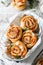 Unsweetened snails and puff pastry with bacon, sesame seeds and rosemary