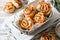 Unsweetened snails and puff pastry with bacon, sesame seeds and rosemary