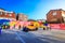 Untitled tourists visit the parking lot that displays the historic yellow car of Louis Vuitton on Jun 19, 2017 in