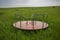 Unused merry-go-round in a vast North Dakota landscape
