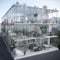 Unusual apartment building with transparent walls, creative architectural