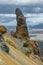 Unusual awkward even comic rock formation as a erected phallus in volcanic mountains Landmannalaugar in Iceland