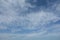 Unusual cirrus clouds in the blue sky. Beautiful sky background
