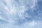 Unusual cirrus clouds in the blue sky. Beautiful sky background