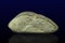 Unusual decorative stone like bread on the dark background - close up