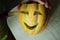 Unusual Halloween melon, cutting process, knife and male hands