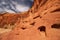 Unusual holes carved into the desert sandstone by erosion.