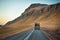 Unusual Icelandic scenery of a garbage truck on the road