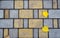 Unusual paving stones texture background with couple autumn leaves