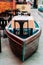 Unusual restaurant interior: dining table in the colorful fish boat. Marine ambience