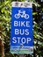 An unusual sign stating `Bike Bus Stop`