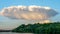 Unusual sky, beautiful cloud in the form of a plate, background sky with clouds