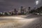 Unusual snow in Downtown Houston at night with snowfall at Eleanor Park