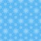Unusual snowy Christmas seamless pattern, bright snowflake for design on blue