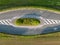 Unusual Split: Countryside Road Curiously Divided Amidst Fields