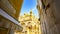 Unusual view of Basilica di San Marco from narrow street, Venice, Italy