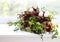 Unusual wedding composition with succulent flowers, fig and hop