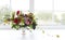 Unusual wedding composition with succulent flowers, grape, fig a