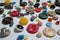 Unusually diverse lot of bright multi-colored variety of round buttons, different textures, diameter, on a white background