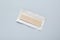 Unwrapped stick of chewing gum on light grey background, top view