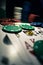 Up close photograph of playing cards and stacks of poker chips