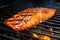 up close, salmon fillet with apple cider glaze sizzling on a bbq grill