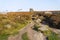 Up a rugged path to Mother Cap on misty autumn Derbyshire morning