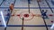 Upclose shot of figures of plastic hockey players in red and blue uniform