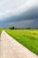 Upcoming thunderstorm on Elbe cycle path in Lower Saxony