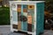 upcycled cabinet with repurposed doors, handles and knobs