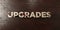 Upgrades - grungy wooden headline on Maple - 3D rendered royalty free stock image
