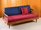 Upholstered red and blue vintage sofa