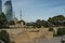 Upland park , Turkish mosque on the background of the tallest buildings