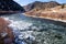 Upper Arkansas River in the Rocky Mountains of Colorado. Winter, ice floats on water