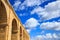 Upper Barrakka Gardens, Valletta, Malta. Terrace under blue sky with few white clouds. Upper view.