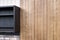 Upper cabinet of black solid ash with dish dryer near wainscoting