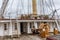 The upper deck on the frigate Jylland with the steering wheel and the mast