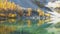 Upper eagle lake with golden larches in the sawtooth range of Washington