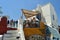 Upper Facade Of The Buildings On The Beautiful Main Street Of Oia On The Island Of Santorini. Architecture, landscapes, travel, cr