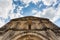 Upper facade view of Petit Palais et Cornemps romanesque church